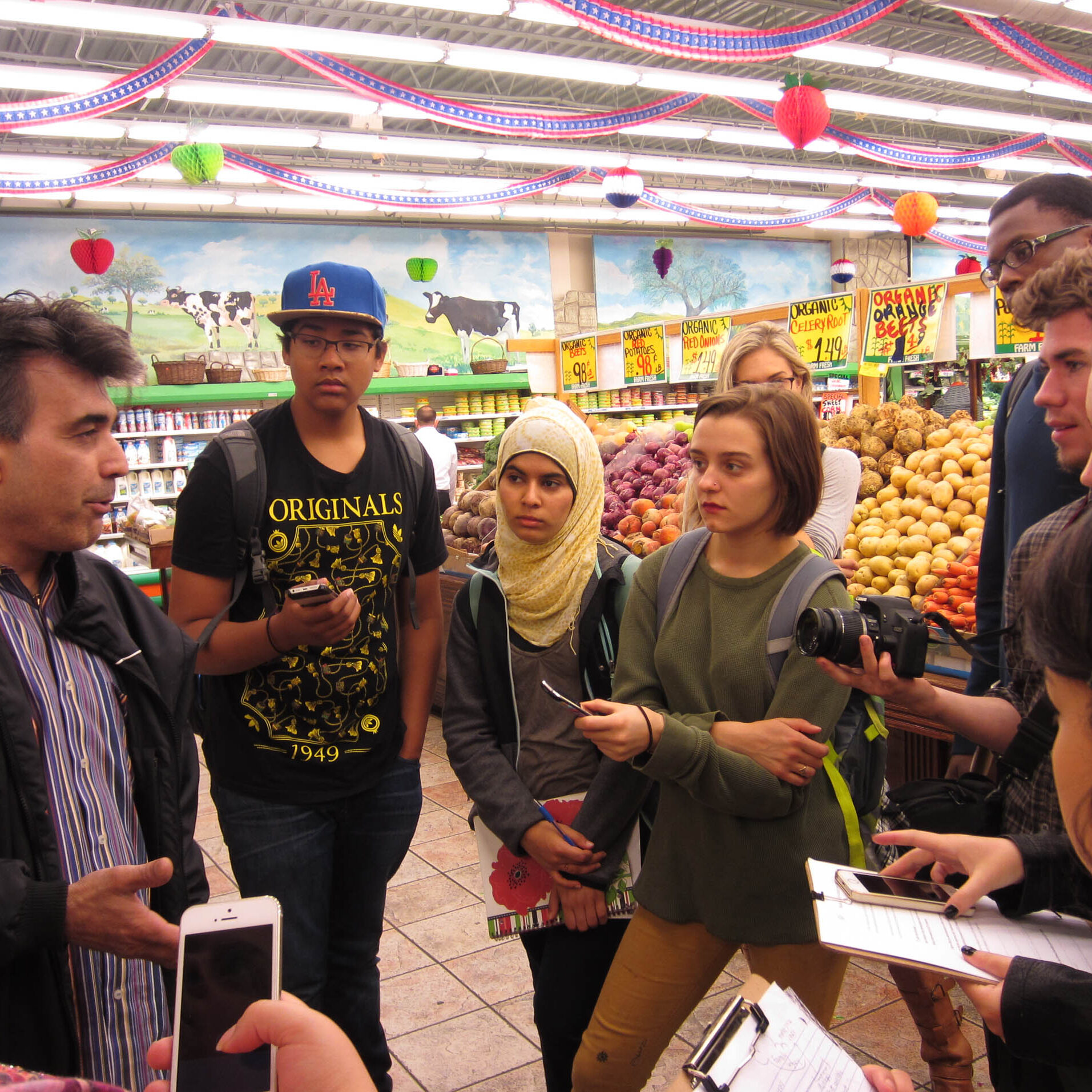 High school students learning about the food cycle